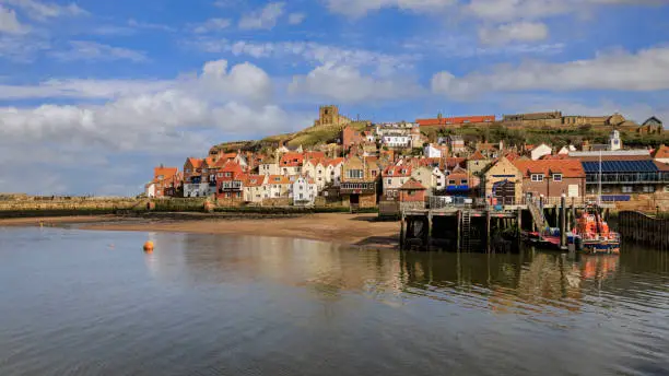 Whitby harbour and church on the Yorkshire coast, UK.