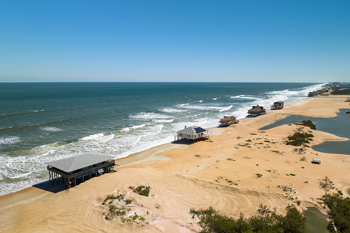 a roaded collapsing into the sea due to sea level rise on the Holderness coast -  Climate Change