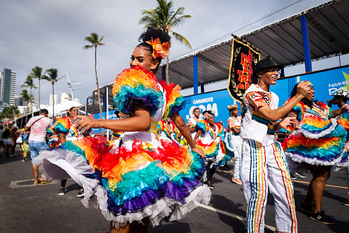 Salvador, Bahia, Brazil - February 11, 2023: Traditional cultural group from Bahia performs during the Fuzue parade in Salvador.