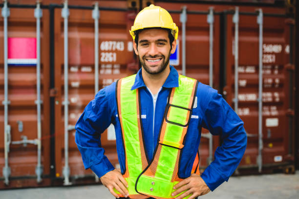 istock Industrial warehouse foreman working at overseas shipping container yard 1474687473