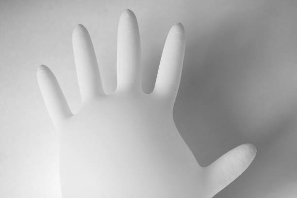 istock Medical glove on a white background, place for text. 1474688824