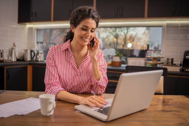 istock Young entrepreneur is working from home 1474689347