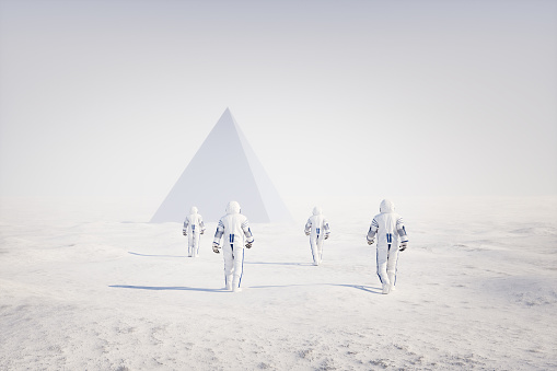 Astronauts walking towards mysterious pyramid over a frozen winter landscape of an exo planet's surface. 3D generated image.