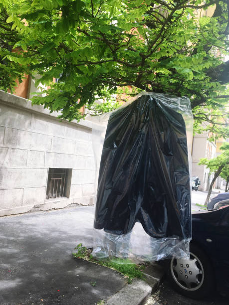 istock jacket hanging in trees on street 1474690973