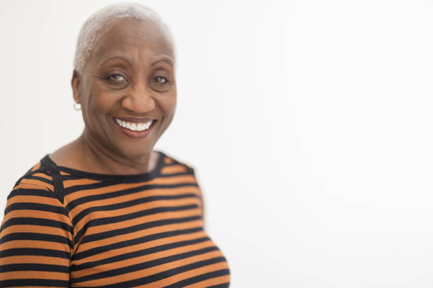 istock Cheerful Black Woman Looking at Camera 1474691015