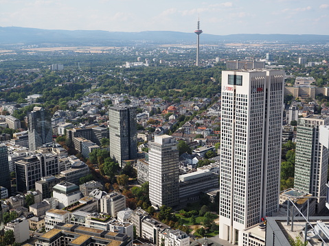 Frankfurt, Hessen, Germany - September 20 2022: UBS Bank European Headquarters building ( also known as the Opera Tower) in Frankfurt Germany the front from above with the cityscape.