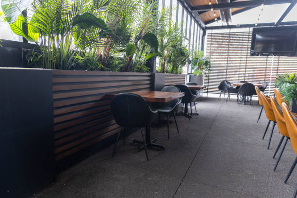 istock Interior of Modern Cafe with an Outdoor Dining Zone 1474694987