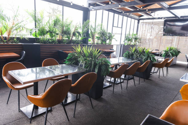 istock Interior of Modern Cafe with an Outdoor Dining Zone 1474695013