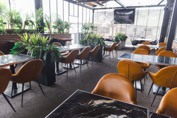 istock Interior of Modern Cafe with an Outdoor Dining Zone 1474695019