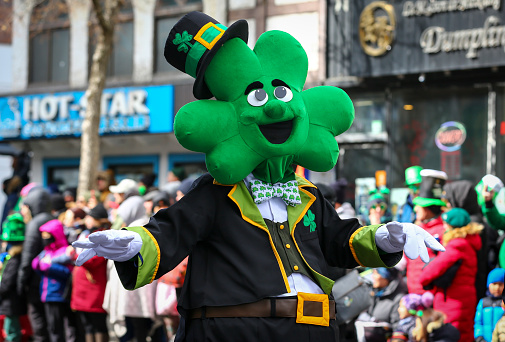 Montreal, Quebec  Canada - 19 March 2023 : Montreal's 2023 St. Patrick's Day Parade takes place on Saint-Catherine Street.