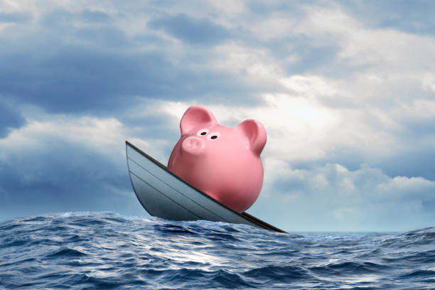 istock Piggy Bank In Sinking Boat 1474696146