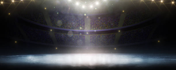 istock Background. Beautiful empty winter background and empty ice rink with lights. Spotlight shines on the rink. Bright lighting with spotlights. Dark panorama 1474697476