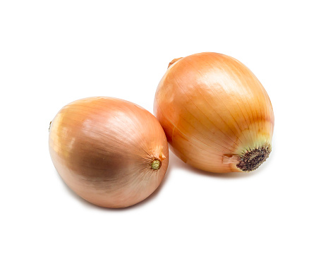 Two fresh orange onions are isolated on white background with clipping path.