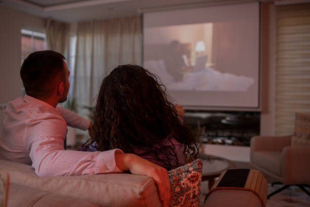 istock Couple is watching a movie. 1474702307