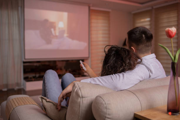 istock Couple is watching a movie. 1474702310