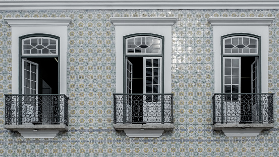 Recife, Pernambuco, Brazil:Windows and azulejos of a colonial building.