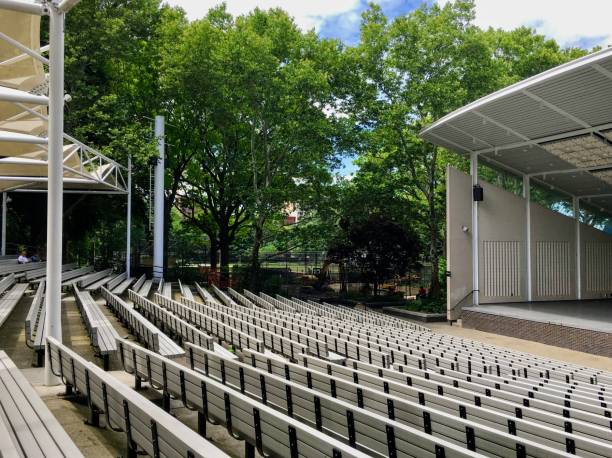 Richard Rodgers Amphitheater in Marcus Garvey Park View of the seating in the Richard Rodgers Amphitheater in Marcus Garvey Park in Harlem during the day in the summer harlem park stock pictures, royalty-free photos & images