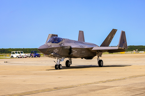 Virginia Beach, Virginia, USA - September 18, 2022: The F35 Lightning just taxiing slowly past with the wings folded. The F35 will taxi out to the runway, then the wings will unfold before take off.