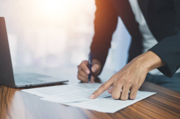 istock Businessman signature document working in office 1474723803