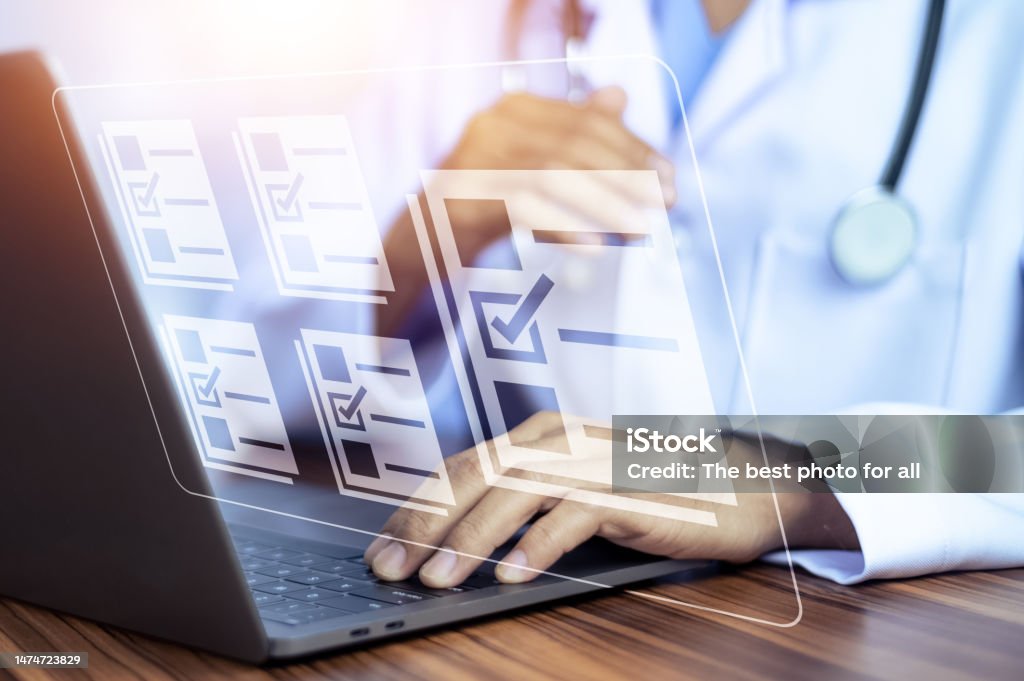 Doctor Computer Files Doctor Workflow Using Technology Document Management On Computer System ...