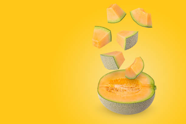 istock Creative layout made from melon on a pastel yellow background. Fruit minimal concept and copy space. 1474726358