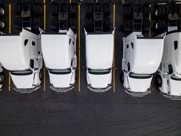 istock Semi trucks on a parking lot 1474729384