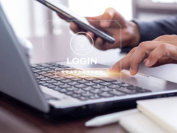istock Concept of accessing private data with password verification. The login icon and password over the screen laptop. 1474732059