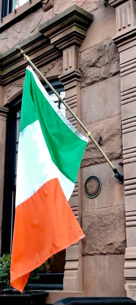 istock Irish Flag Hanging on Brownstone 1474732962