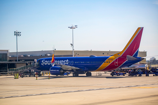 Southwest Airlines Boeing 737-8 Max aircraft with registration N8738K parked at gate at Long Beach Airport in Feb 2022.