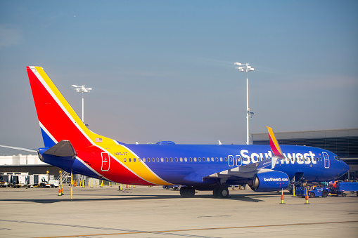 Southwest Airlines Boeing 737-8H4 aircraft with registration N8513F parked at gate at Long Beach Airport in Feb 2022.