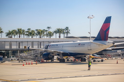 Delta Air Lines Airbus A319-114 aircraft with registration N9364NB parked at gate at Long Beach Airport in Feb 2022.
