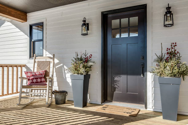 istock Front porch with black door 1474734169