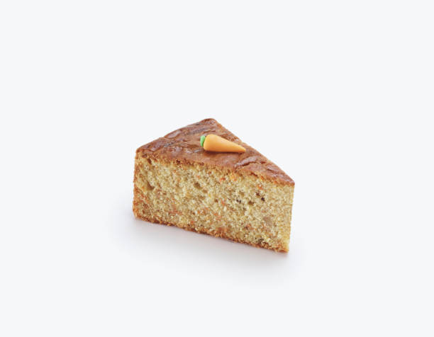 istock A slice of wonderful carrot cake on white background 1474735203