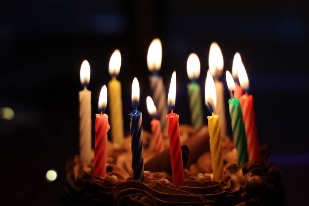 istock Birthday cake with candles 1474737273