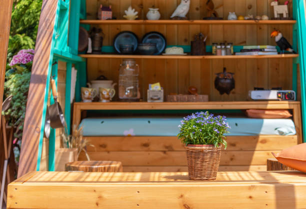 istock Flower pot and store room in backyard garden 1474740926