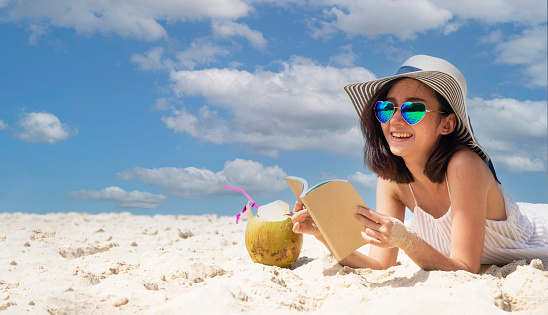 Lifestyle woman and relax chill on beach background. Travel summer vacations, copy space for banner.Summer vacations