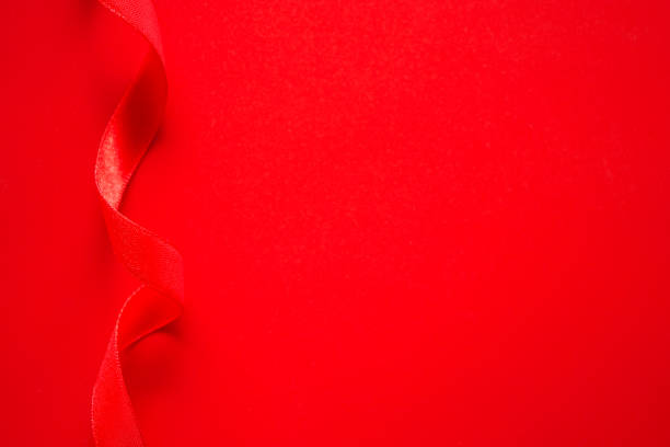 istock Red background with red satin ribbon frame, Valentine or Love background 1474749095