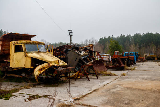 istock Old rusty abandoned damaged trucks in Chernobyl exclusion zone, Ukraine 1474749131