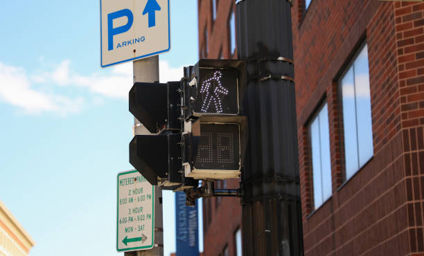 istock street traffic light during rush hour at crosswalk red and yellow at intersection for pedestrian safety depicting a control  warning and caution in urban street with signaling danger 1474749139