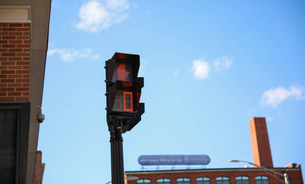istock street traffic light during rush hour at crosswalk red and yellow at intersection for pedestrian safety depicting a control  warning and caution in urban street with signaling danger 1474749159