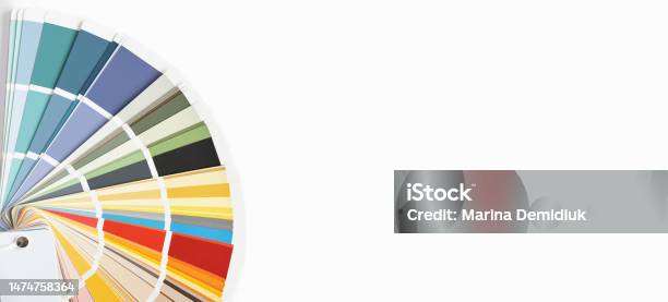 Color Guide Close Up Assortment Of Colors For Design Colors Palette Fan On A White Concrete Wall Background Graphic Designer Chooses Colors From The Color Palette Guide Coloured Swatches Catalogue Stock Photo - Download Image Now
