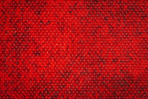Macro of a red denim texture.