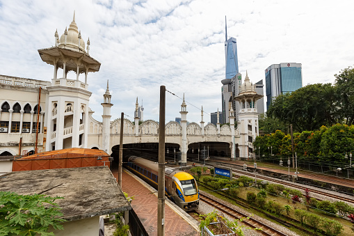 Kuala Lumpur, Malaysia – February 5, 2023: Train railway station and skyscraper Merdeka PNB 118 Tower in Kuala Lumpur, Malaysia.