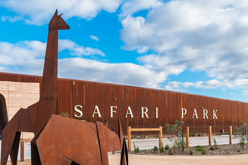 Adelaide, South Australia - May 8, 2022: Monarto Safari Park new entrance with metal rusty sculptures viewed from the car park side on a day