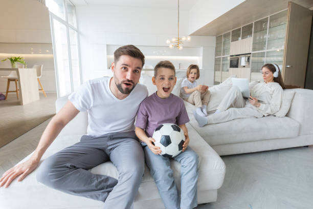 istock Family having rest at home 1474763943