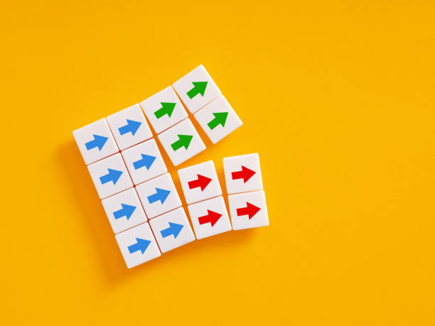 istock Separation and split in the team. Collapsing teamwork. Conflict of interests, going different directions. 1474766419