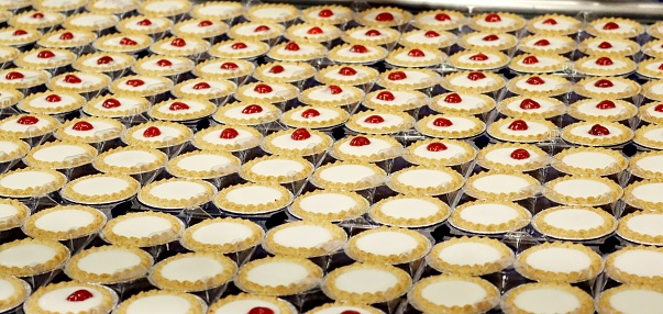 The production line of Mr Kipling's cakes at their Stoke-on-Trent factory making Cherry Bakewells.