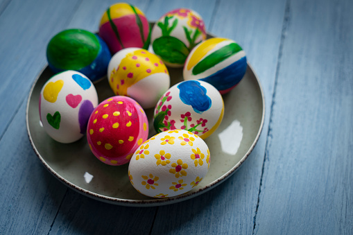 colorful painted easter eggs in a nest