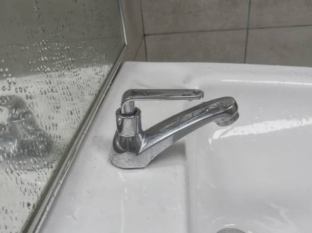 istock Modern shiny iron faucet. 1474770827