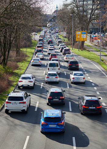 Düsseldorf, Germany - February 28, 2023: Traffic jam on the „Kennedy-Damm“ in the north of Düsseldorf, direction center of town.
